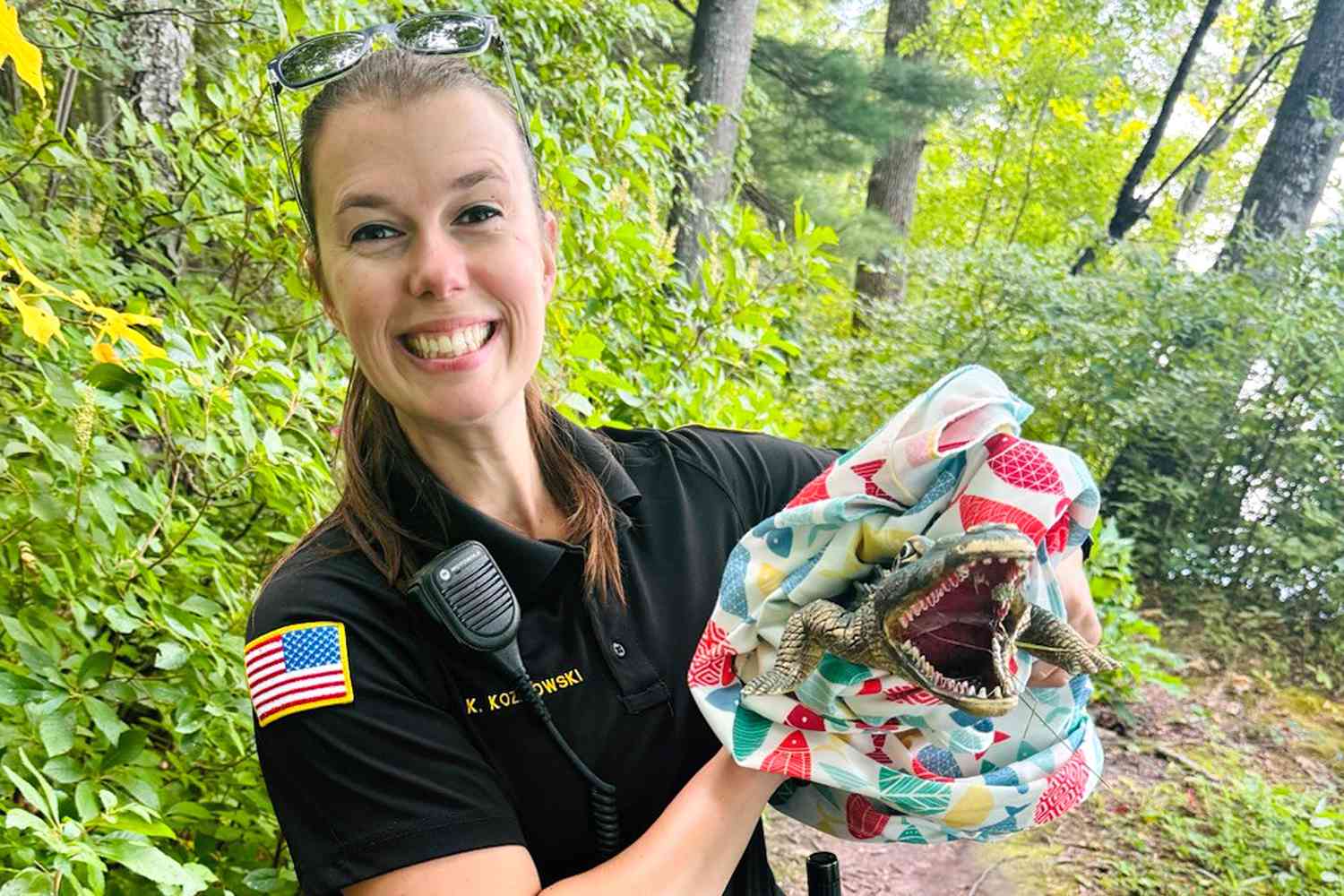 Massachusetts Officers Called to Wrangle an Alligator Find an Adorable Surprise Instead