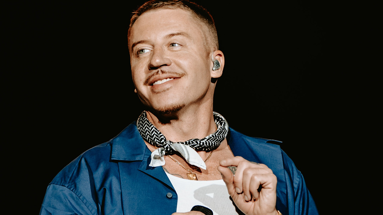 Macklemore Accidentally Helped Cops Catch a Fugitive Soccer Streaker Mid-Concert