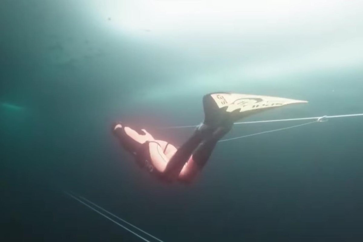 Watch: Woman swims 459 feet under ice without oxygen - UPI.com